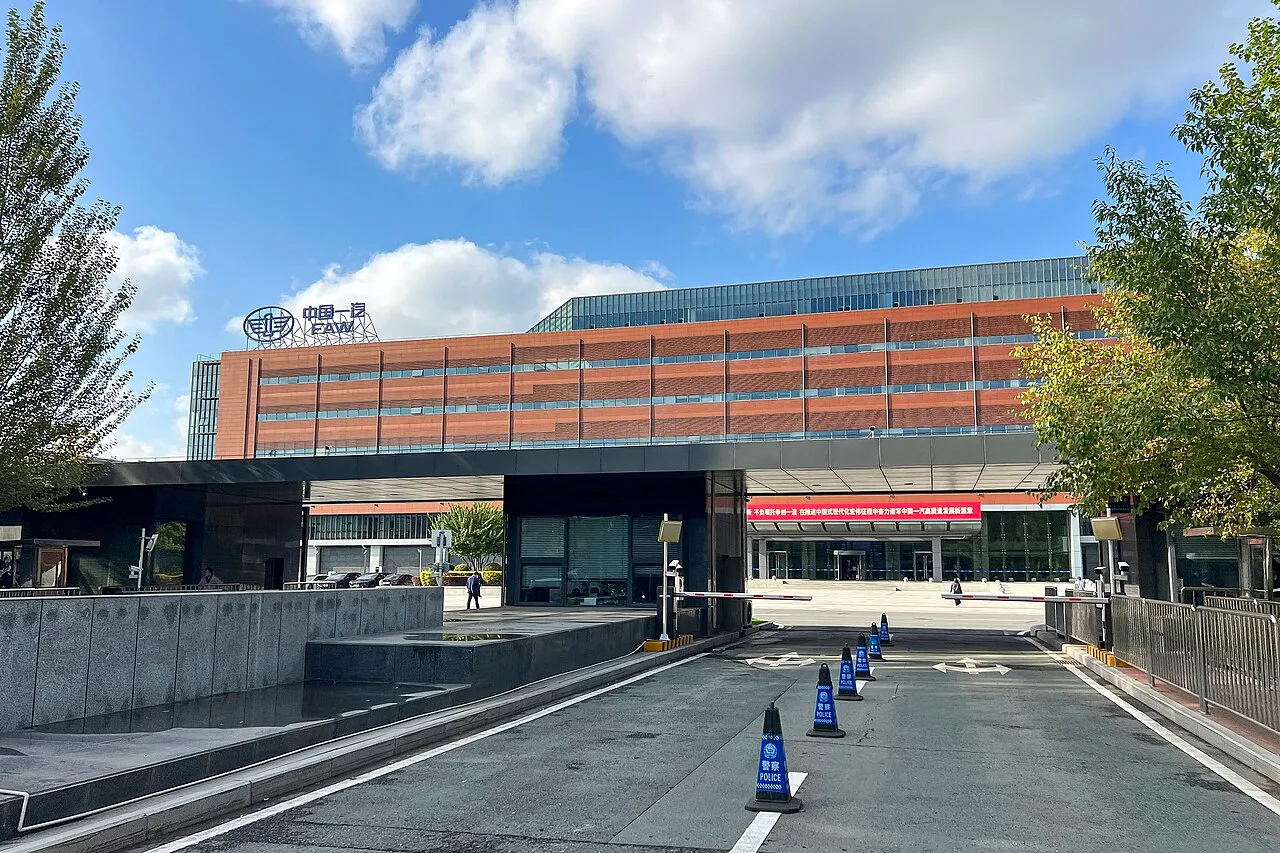 FAW building with a glazed entrance and vehicle access controls.